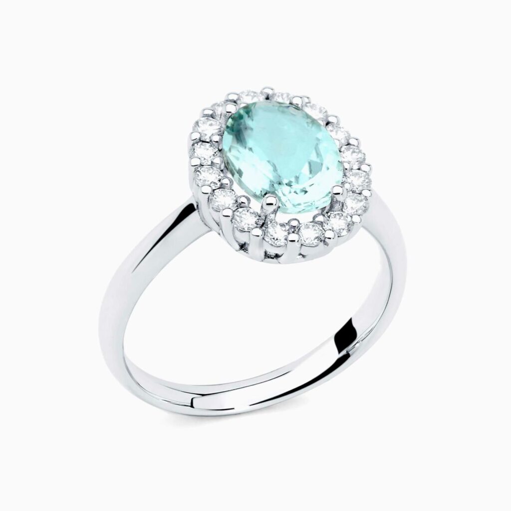 Anillo solitario Claire G en oro 18K con aguamarina central y diamantes