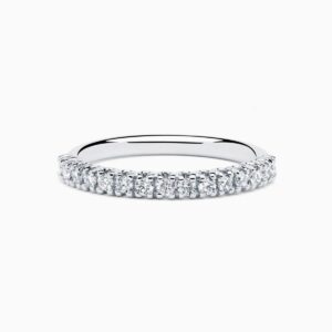Anillo medio rivière Uma P en oro 18K con 15 diamantes y diamante interior