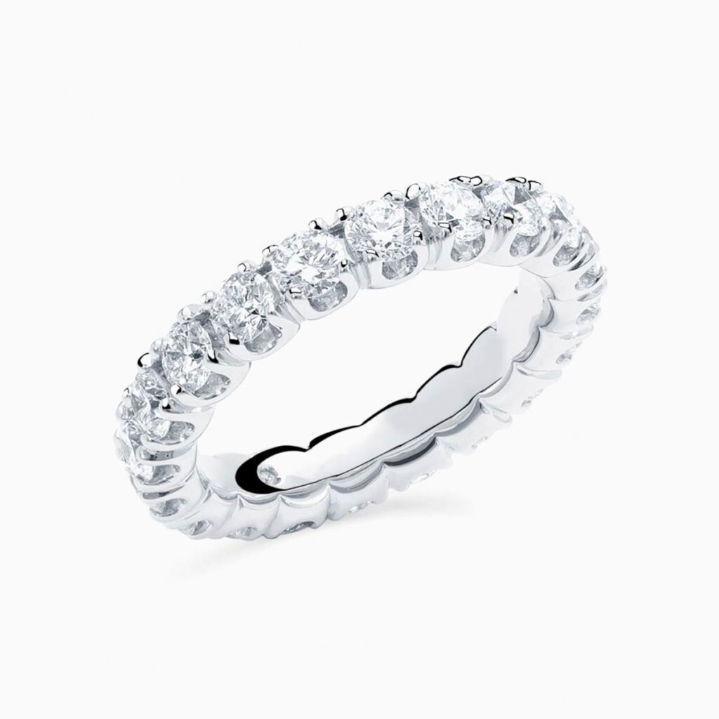 Anillo rivière Uma G en oro 18K con 19 diamantes y diamante interior