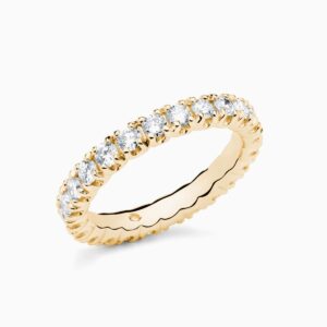 Anillo rivière Uma M en oro 18K con 24 diamantes y diamante interior