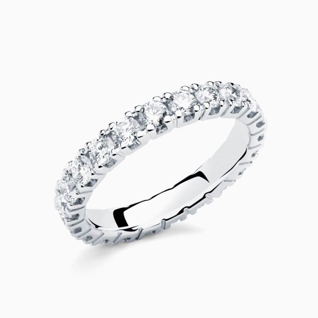 Anillo rivière Celine M en oro 18K con 22 diamantes y diamante interior