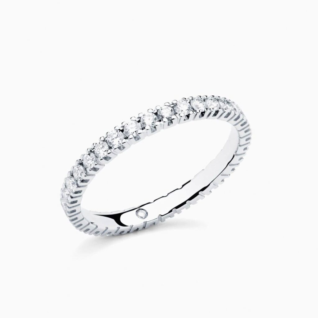 Anillo rivière Uma P en oro 18K con 34 diamantes y diamante interior
