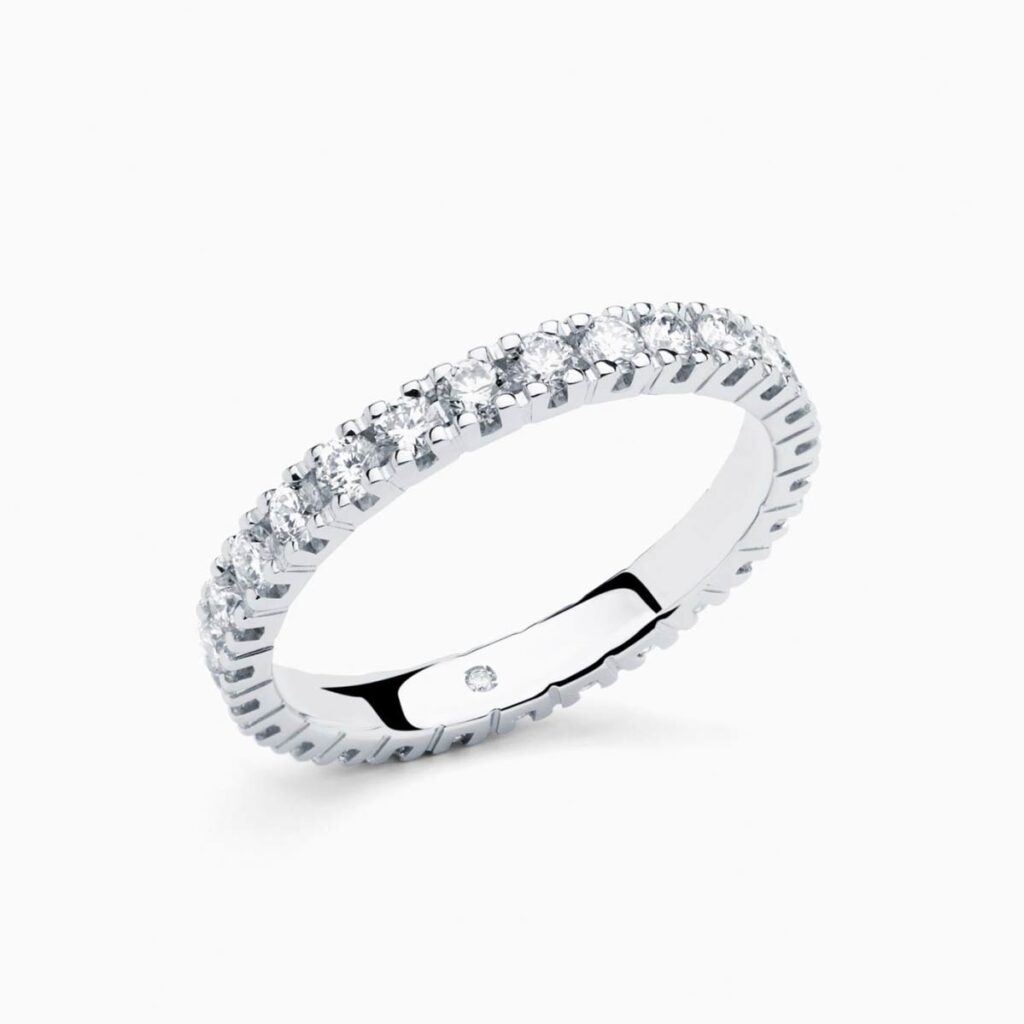 Anillo rivière Celine P en oro 18K con 27 diamantes y diamante interior