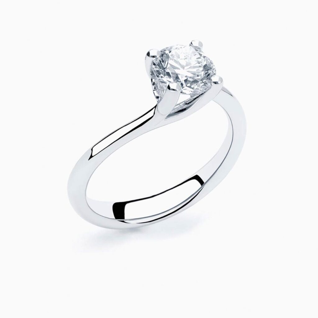 Anillo solitario Curved G en oro 18K con diamante central de 1 quilate