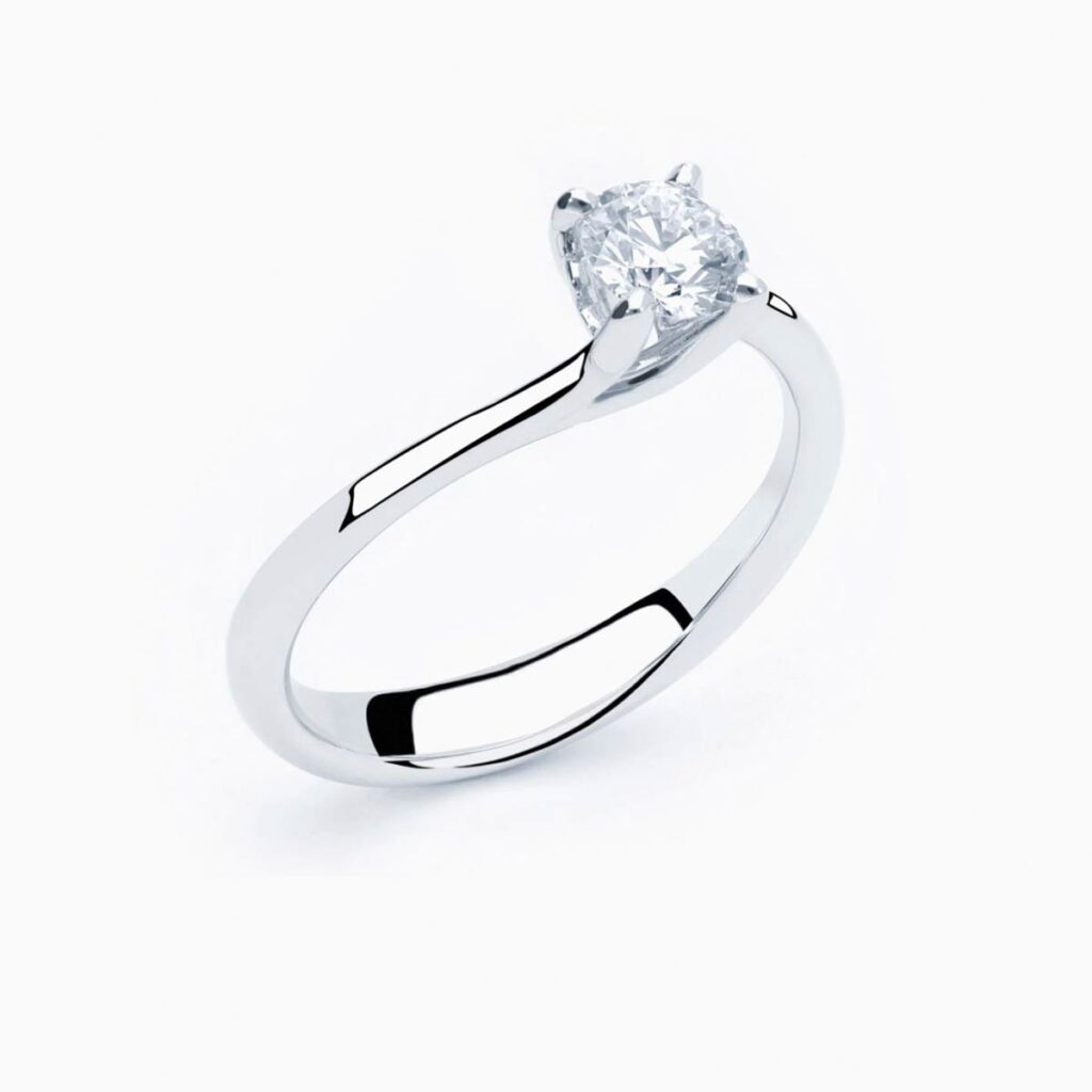 Anillo solitario Curved M en oro 18K con diamante central de 0,40 quilates