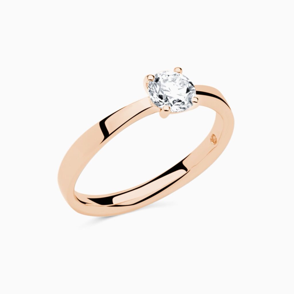 Anillo solitario Harmony Classic M en oro 18K con diamante central y diamante interior